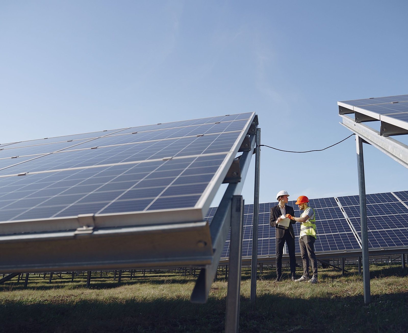 Crew commissioning a ground-mount solar array
